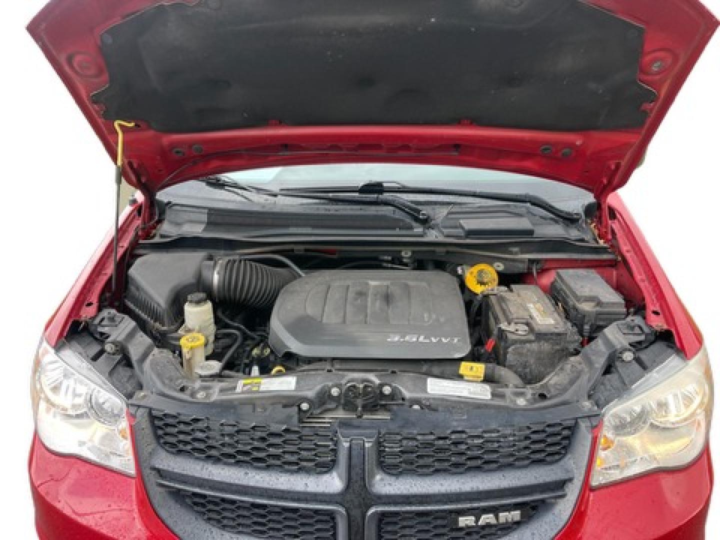 2014 Red /Black Dodge Cargo Van Tradesman (2C4JRGAG6ER) with an 3.6L V6 DOHC 24V engine, 6-Speed Automatic transmission, located at 547 E. Main St., Orwell, OH, 44076, (440) 437-5893, 41.535435, -80.847855 - This 2014 Ram C/V Tradesman is a versatile commercial van equipped with a 3.6-liter Pentastar V6 engine mated to a 6-speed automatic transmission. This one-owner vehicle boasts an auto-dimming rearview mirror, a payload capacity of 1,800 pounds, and a towing capacity of 3,600 pounds. With its robust - Photo#16